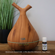 Load image into Gallery viewer, Crystal Aire Sapling LED Ultrasonic Aroma Diffuser &amp; w/ 10ml Citronella Oil
